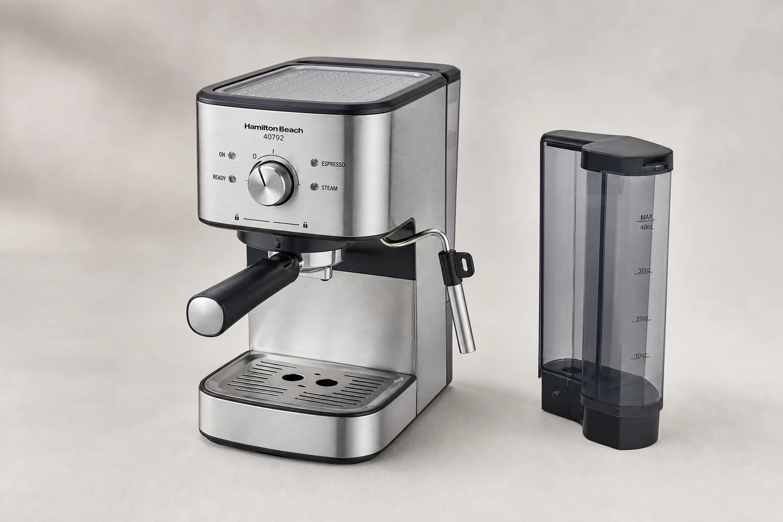 Five budget espresso machines arranged on concrete surface