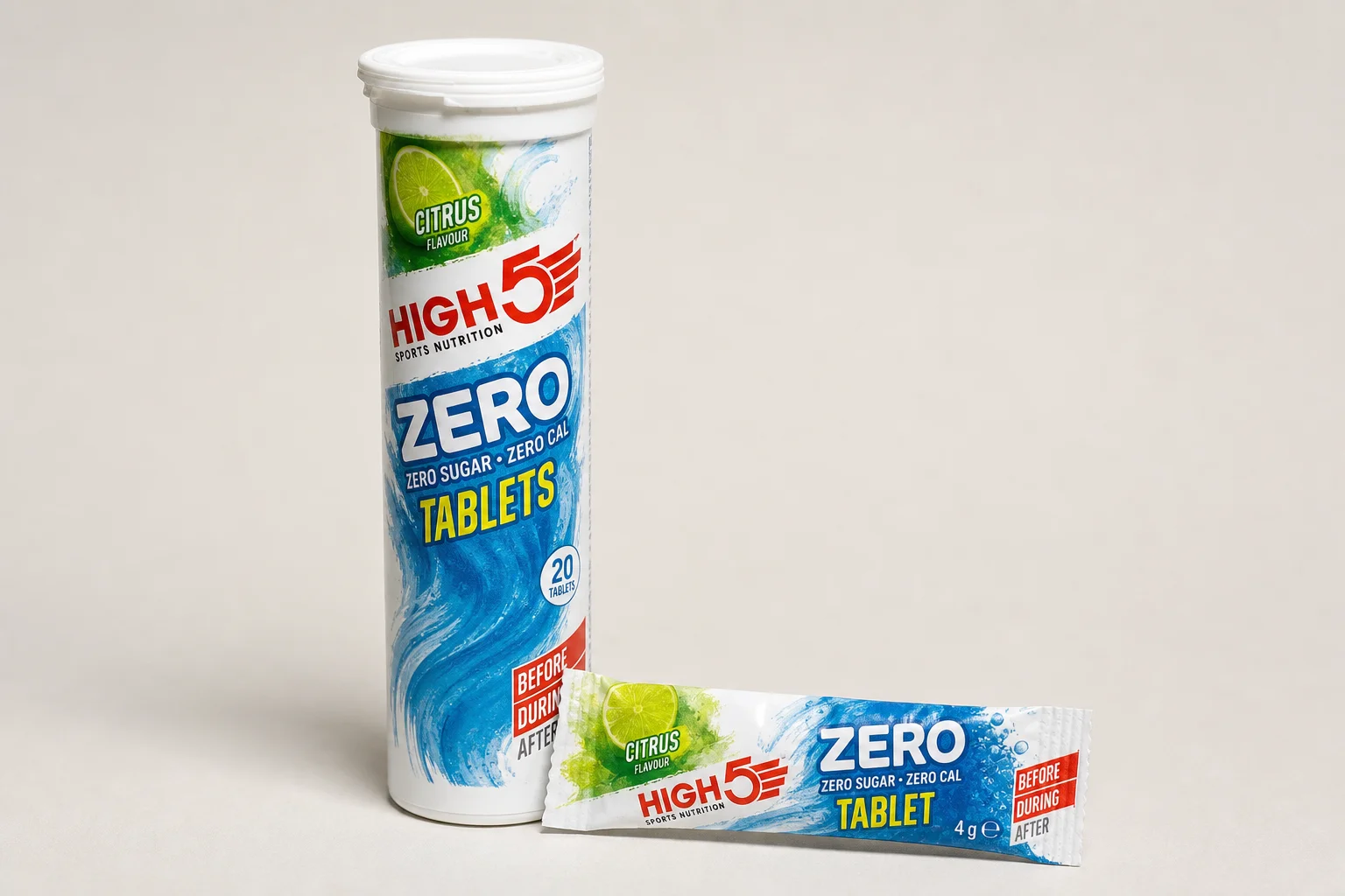 Collection of electrolyte products including powders, tablets, and tubs on concrete surface