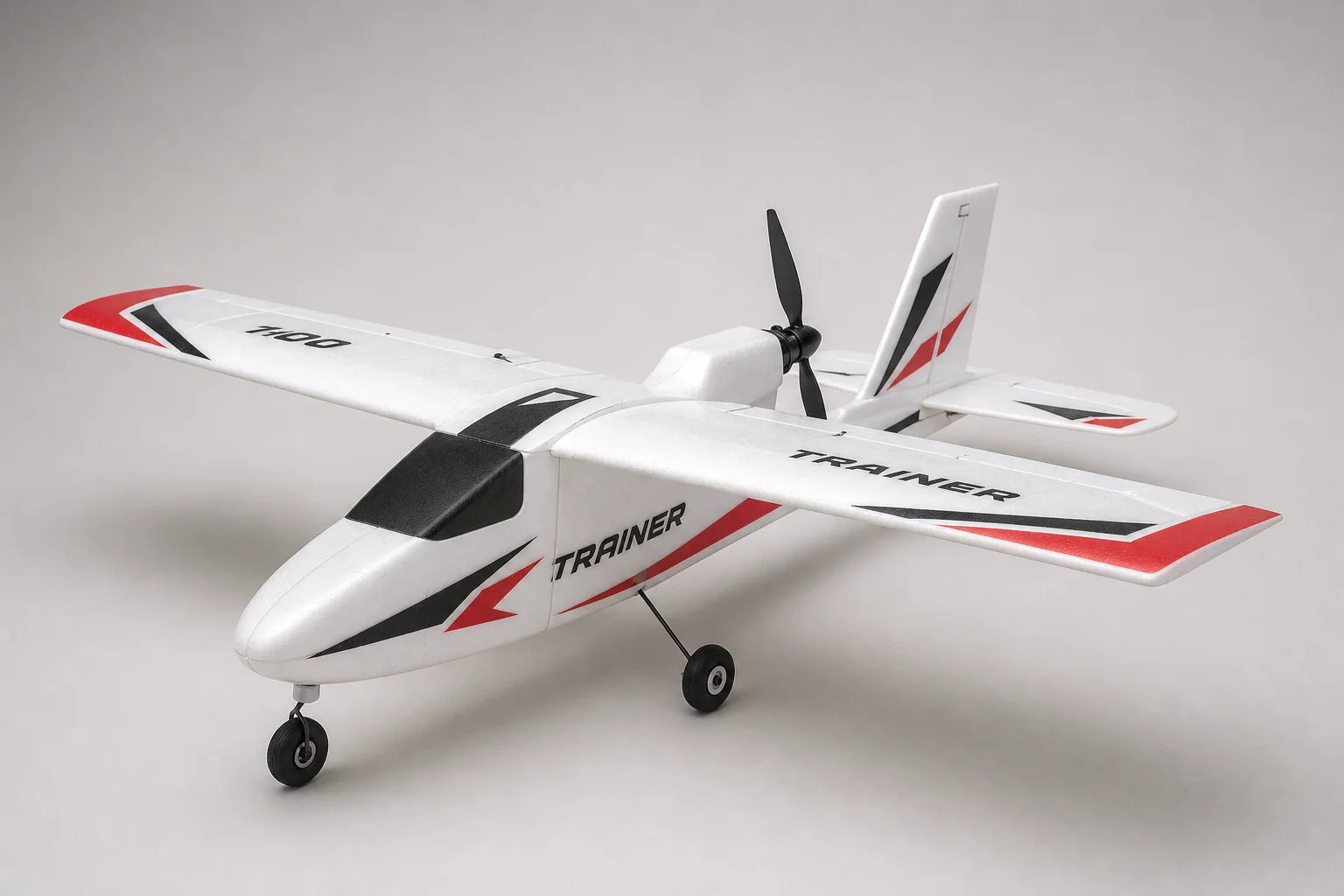 Five beginner RC planes displayed on neutral backdrop