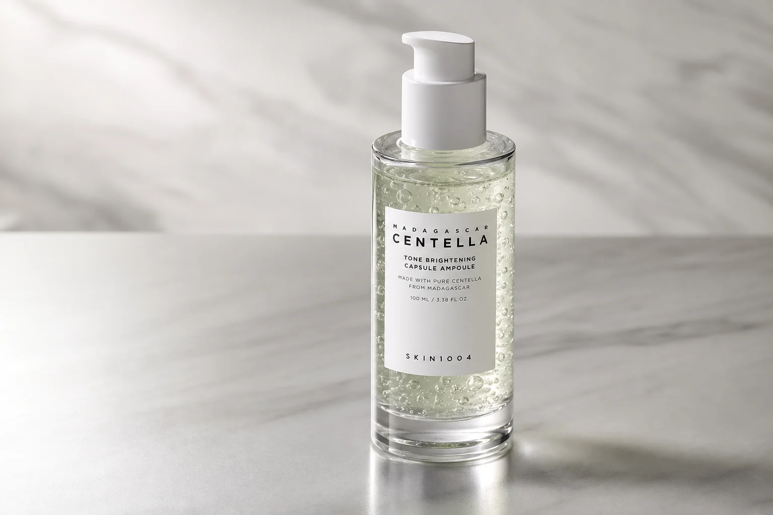 Collection of ten Korean beauty products arranged on marble surface
