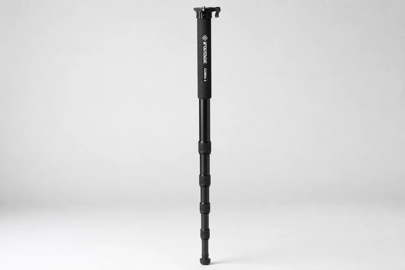 DJI Action 5 Pro in Tilta metal cage with side handle, phone mount, and ND filter