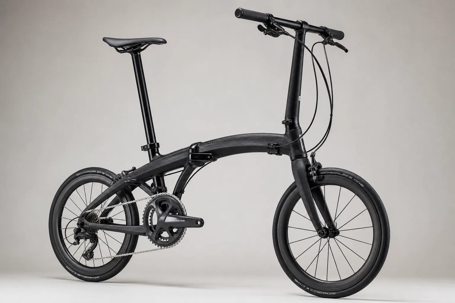 Java Neo 20-inch carbon folding bike on neutral backdrop showing frame geometry and carbon finish