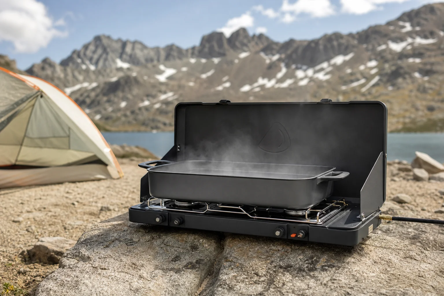 Boiling water in the Jetboil Genesis flux pan over both burners at a campsite