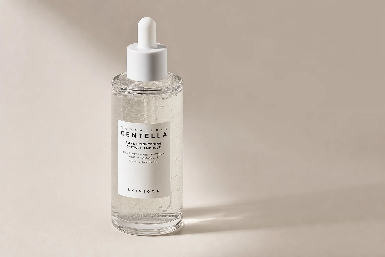Collection of ten Korean beauty products arranged on marble surface