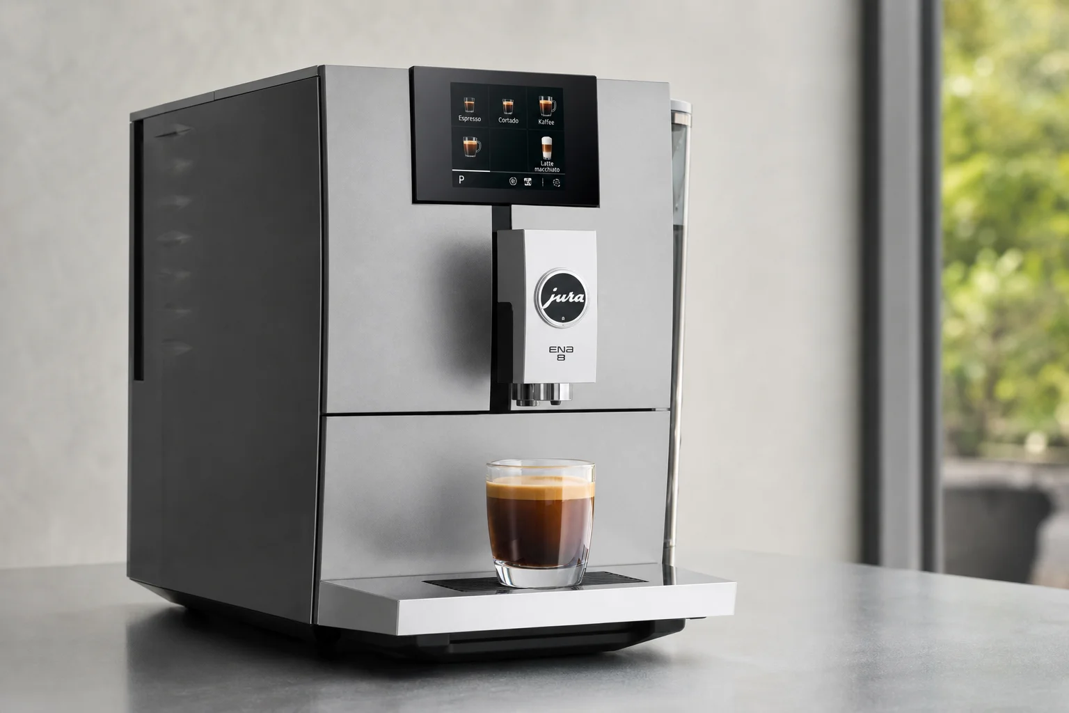 Five Jura espresso machines arranged in a row showing progression from compact to flagship models