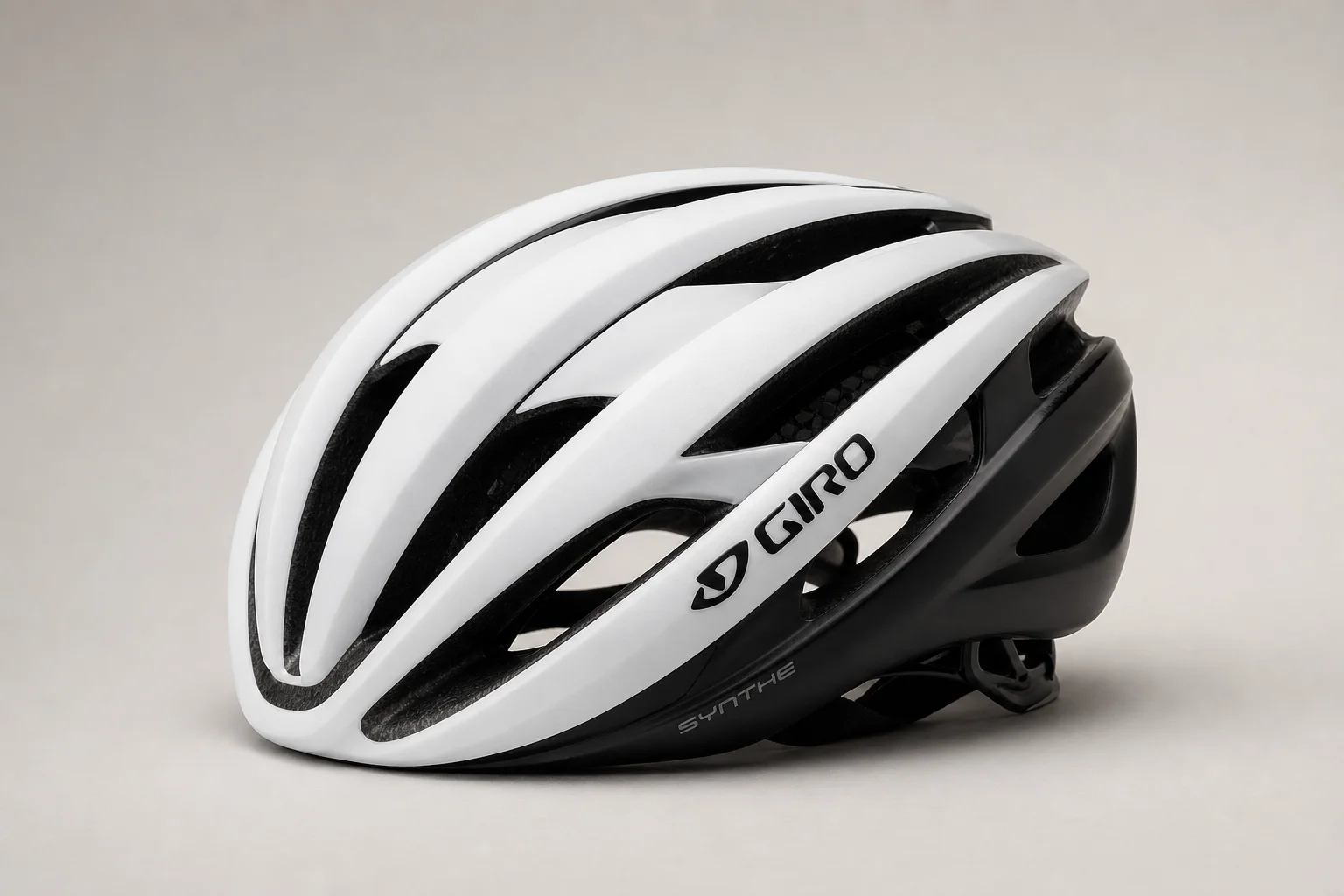 Three cycling helmets arranged side by side: Van Rysel RCR, Met Trenta, and Kask Protone