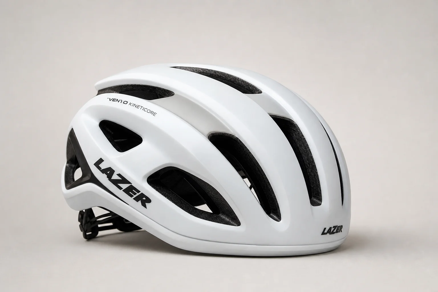 Six aerodynamic road cycling helmets arranged on concrete surface