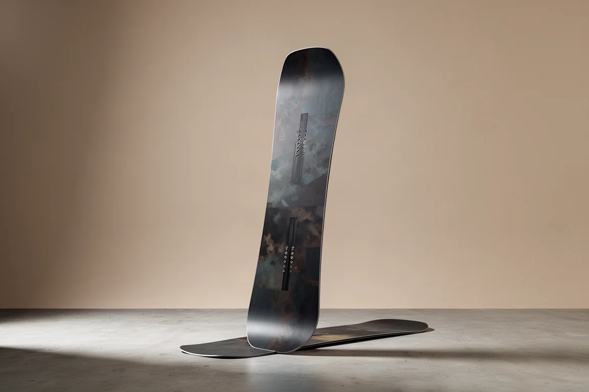 Lib Tech Apex Golden Orca snowboard standing upright on a concrete surface