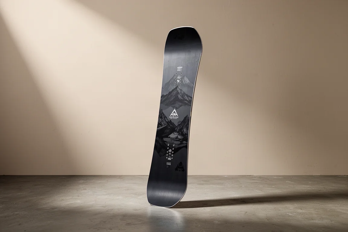 Lib Tech Cold Brew directional snowboard standing upright on grey backdrop