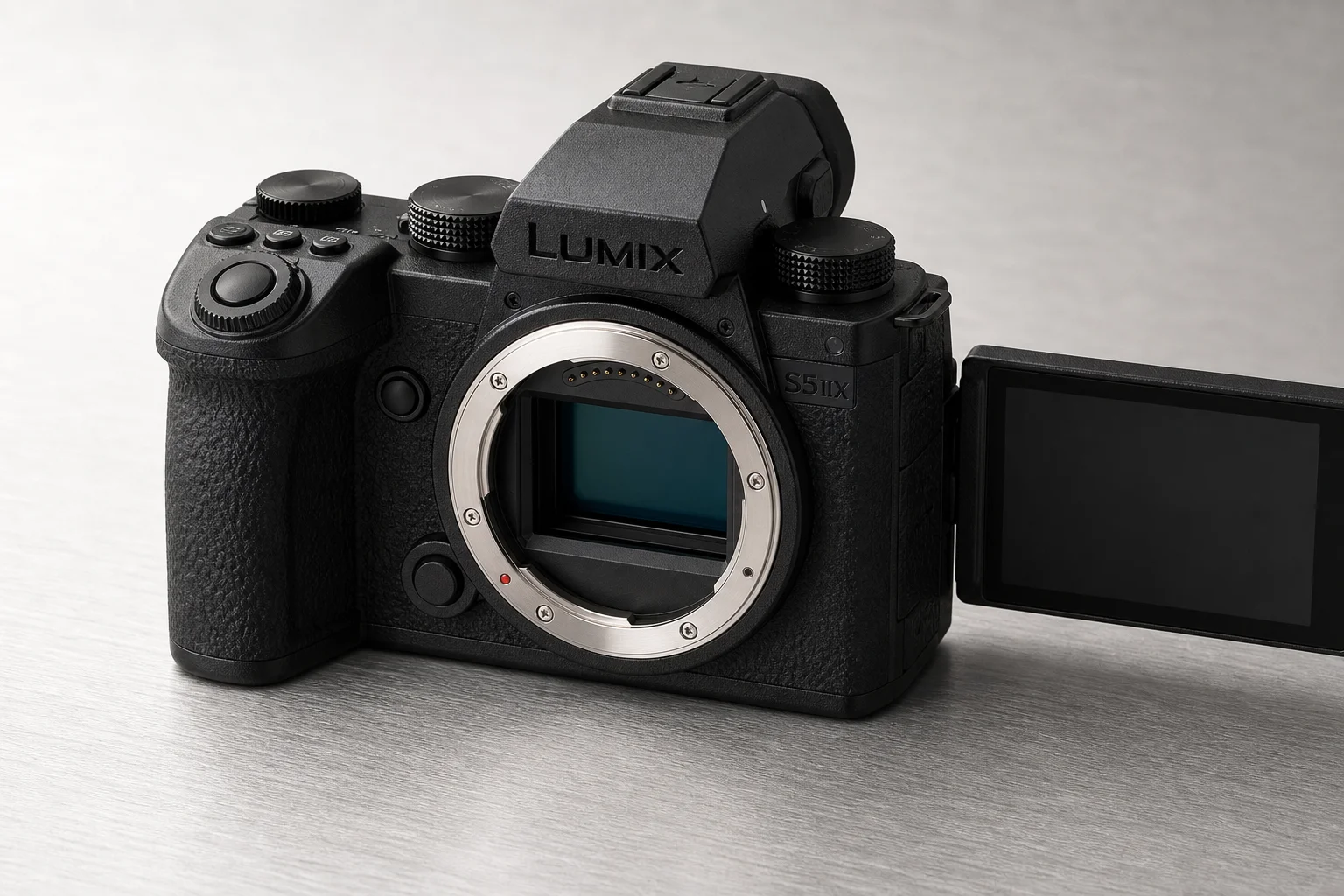 Four full-frame mirrorless cameras arranged on concrete surface