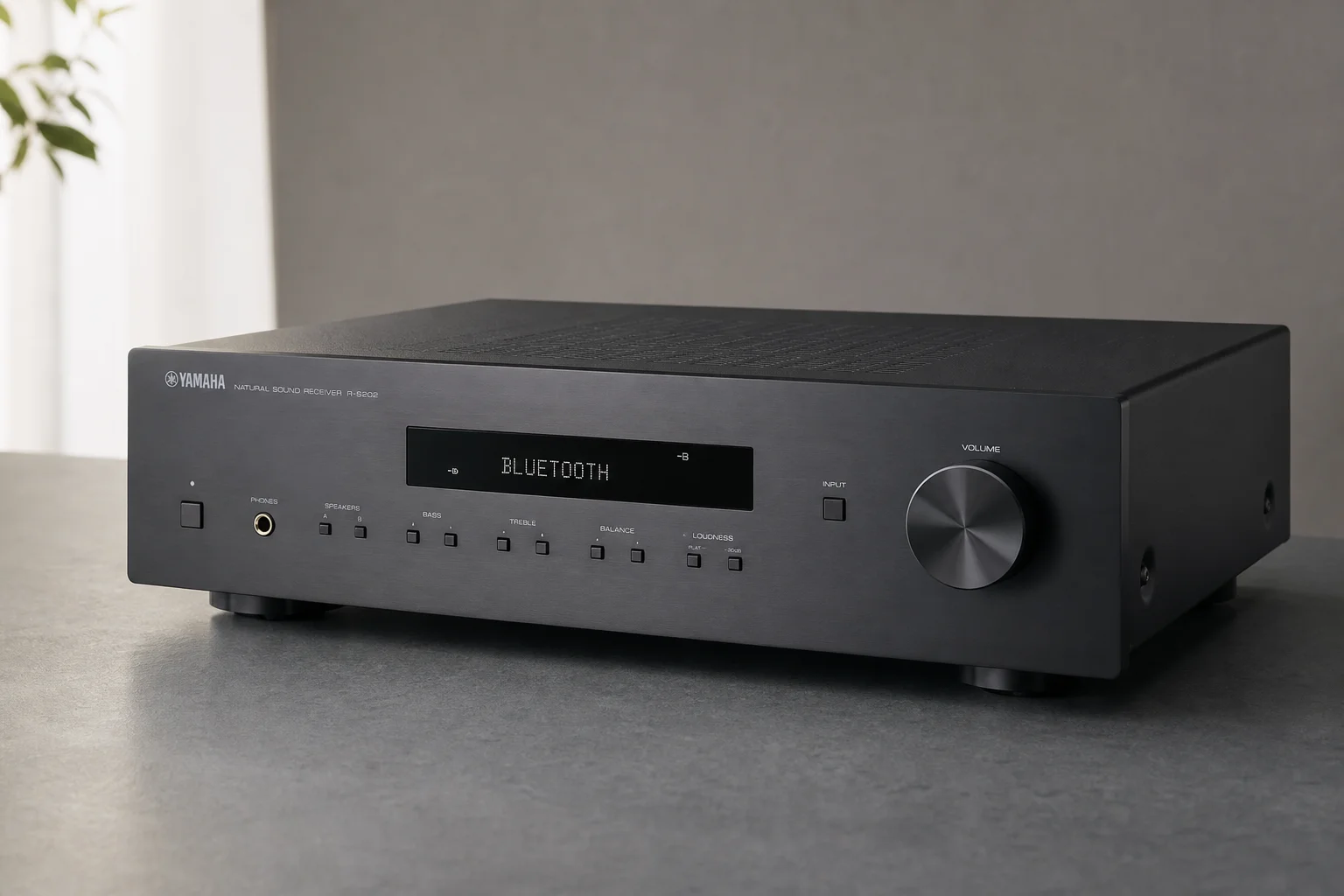 Six stereo receivers arranged on concrete surface showing various sizes and designs