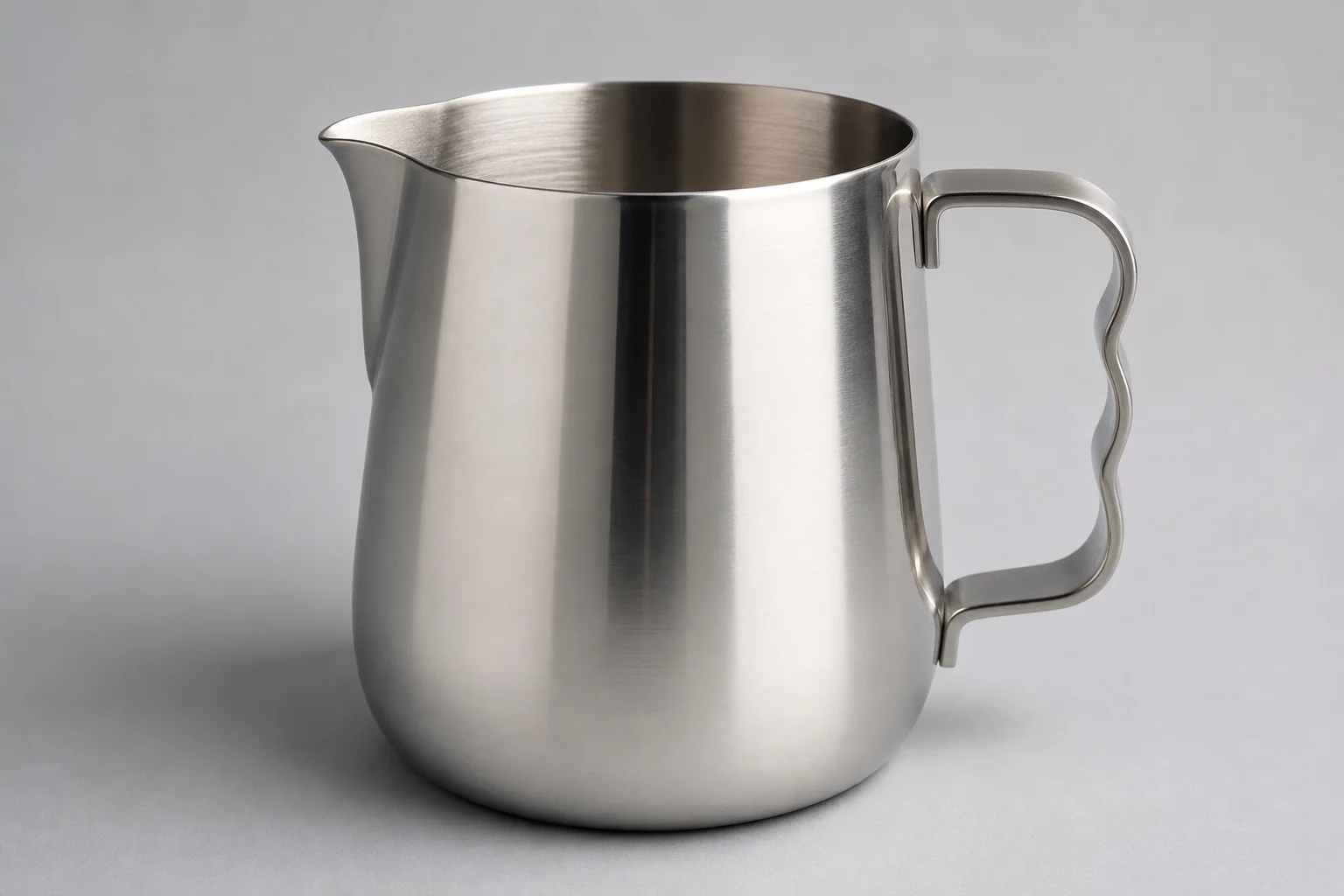 Three MHW-3BOMBER milk pitchers arranged by model: Turbo, 3.0, and 5.0