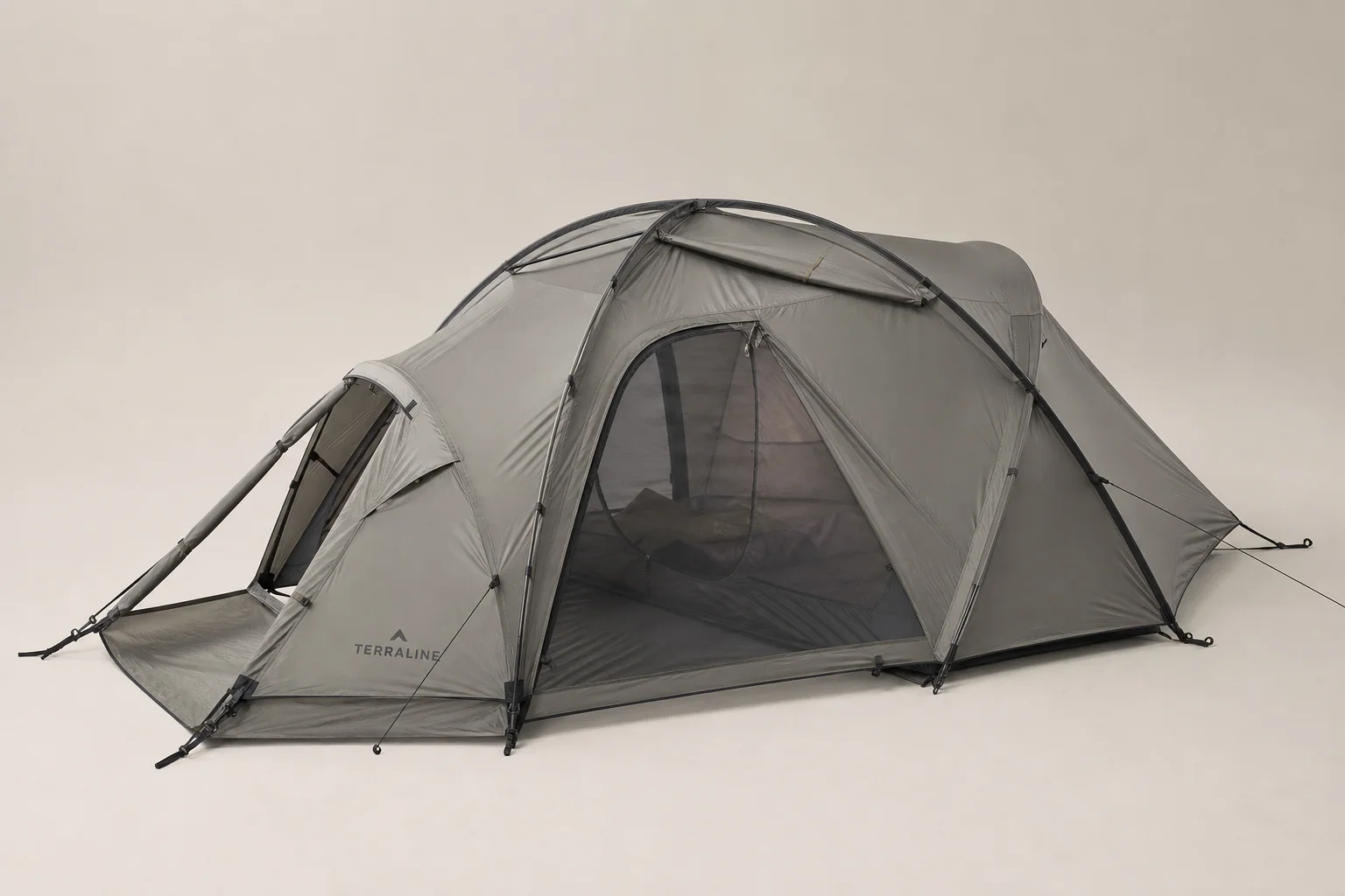 Six two-person backpacking tents arranged on concrete showing variety in design and color