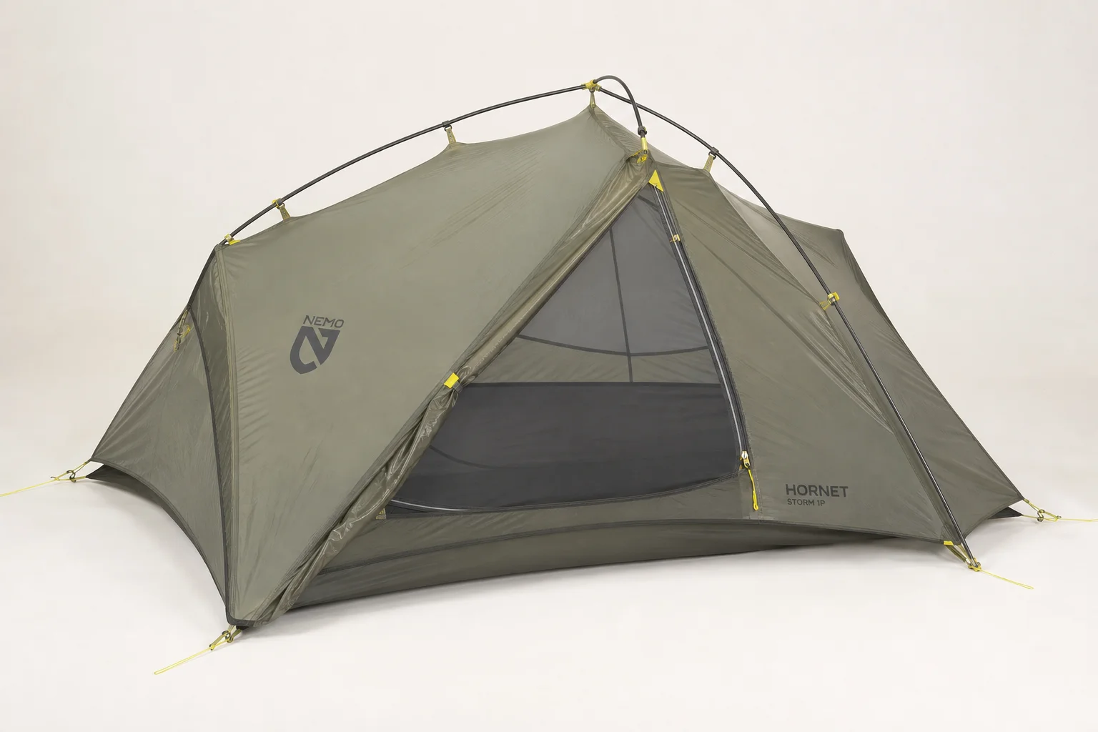Nine hiking tents arranged on neutral backdrop showing variety in size and design
