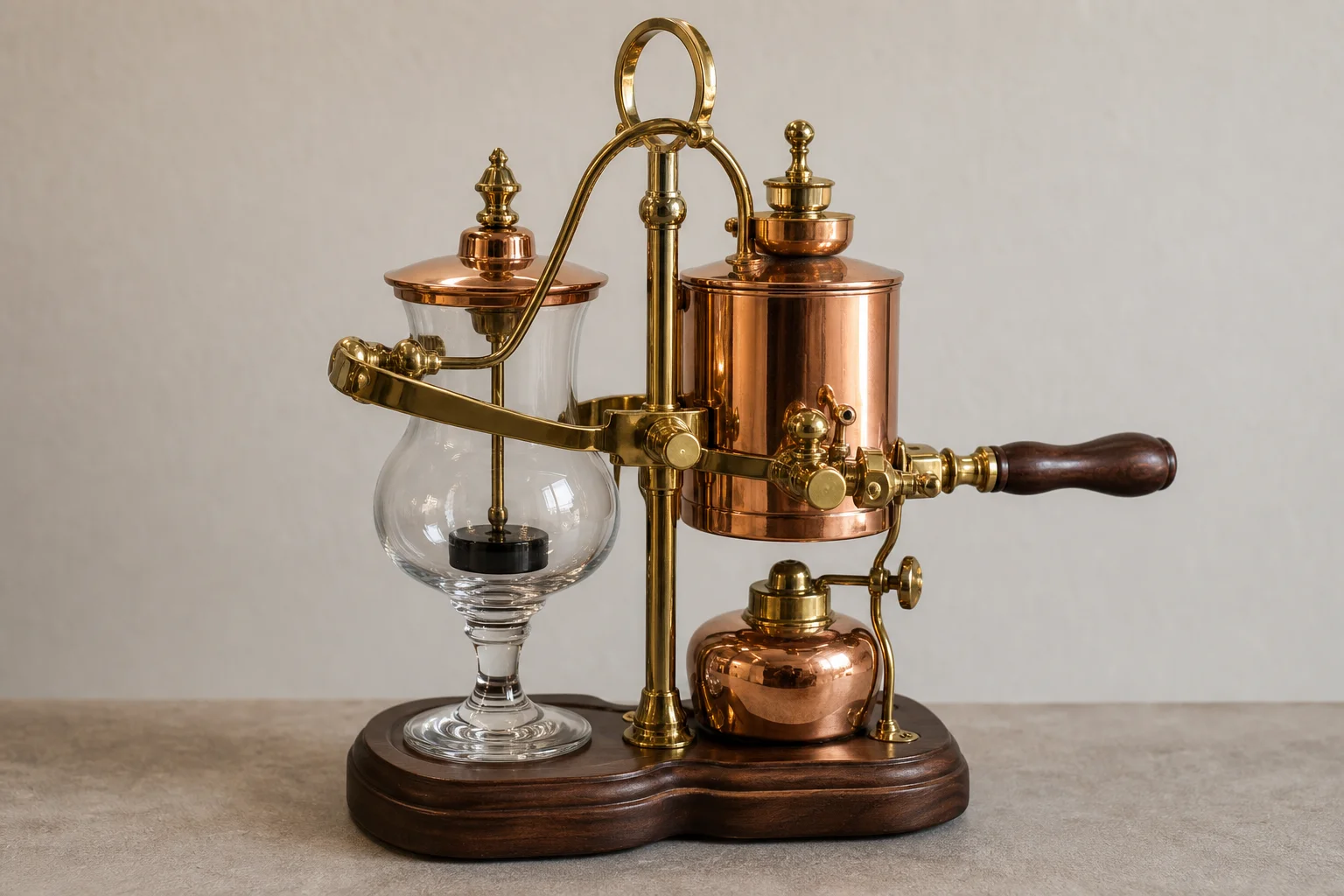 Five vacuum coffee makers displayed on neutral backdrop showing different styles and designs
