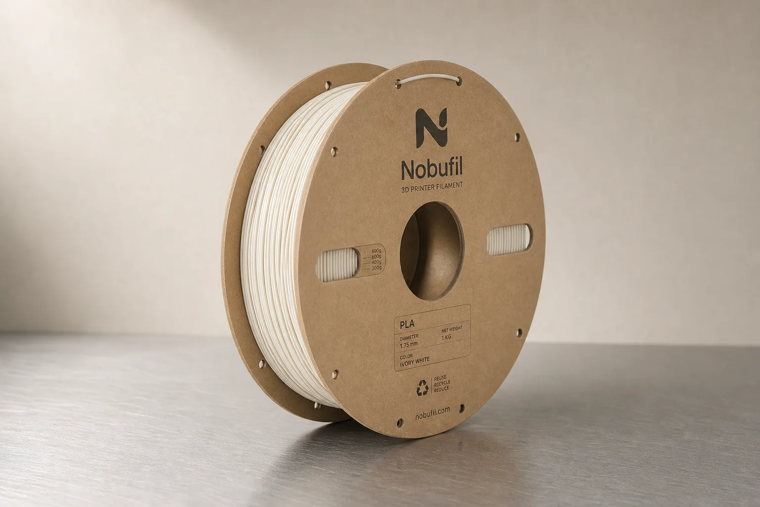 Collection de bobines de filament pour imprimante 3D colorées sur une surface en béton