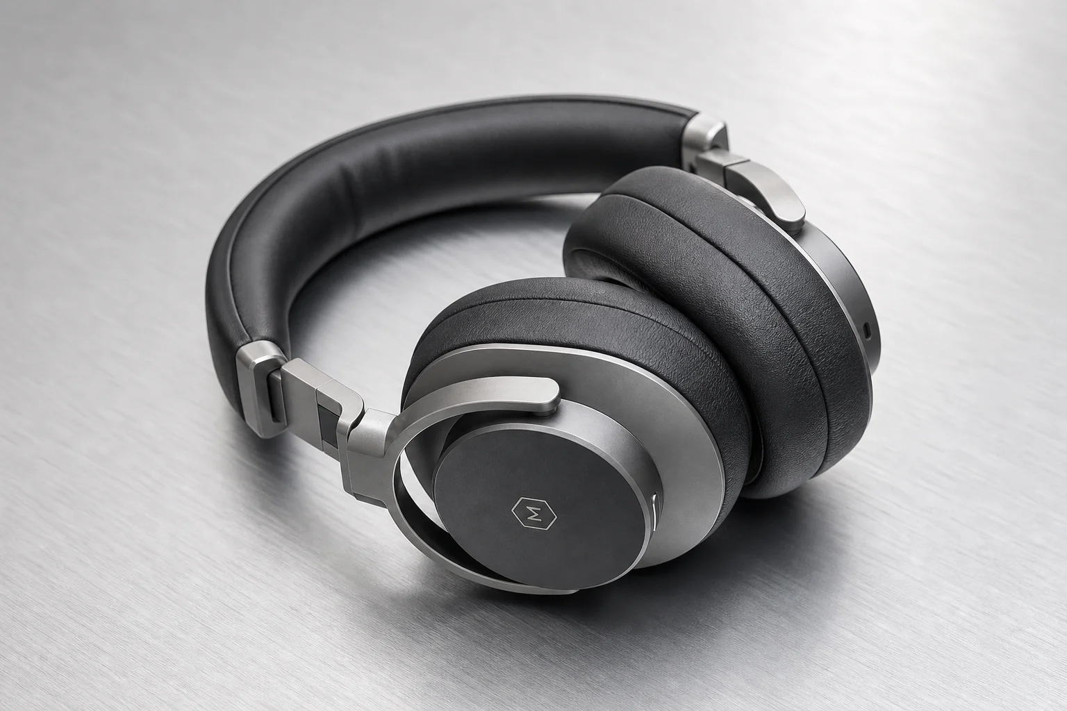 Over-the-ear wireless headphones displayed showing metal hinge construction