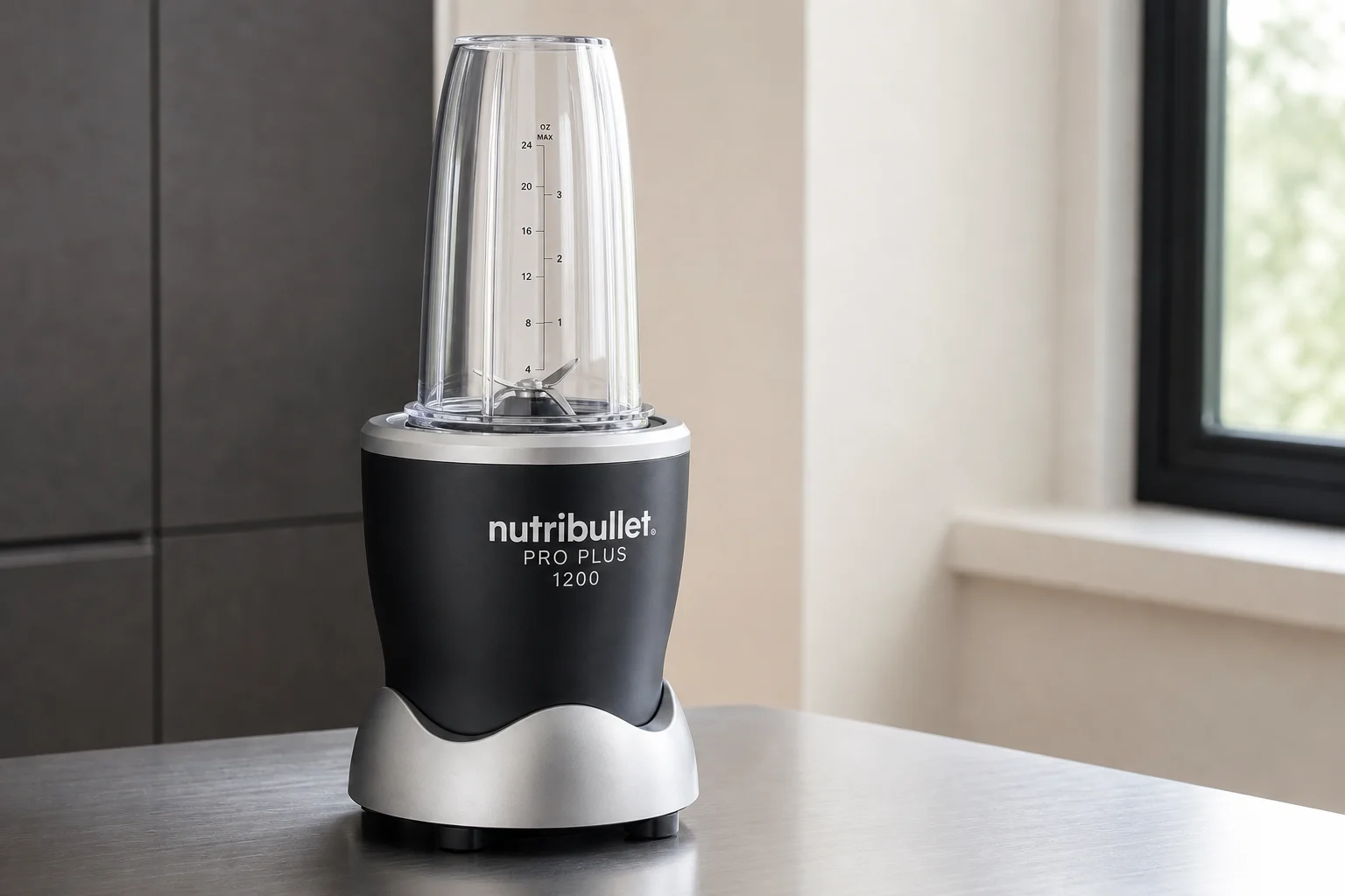 Five NutriBullet blender models arranged by size on a concrete surface