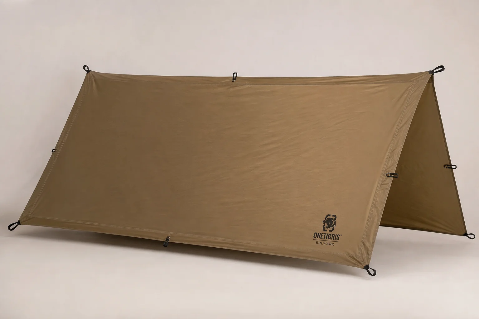 Five trekking tarps displayed side by side showing different designs and colors