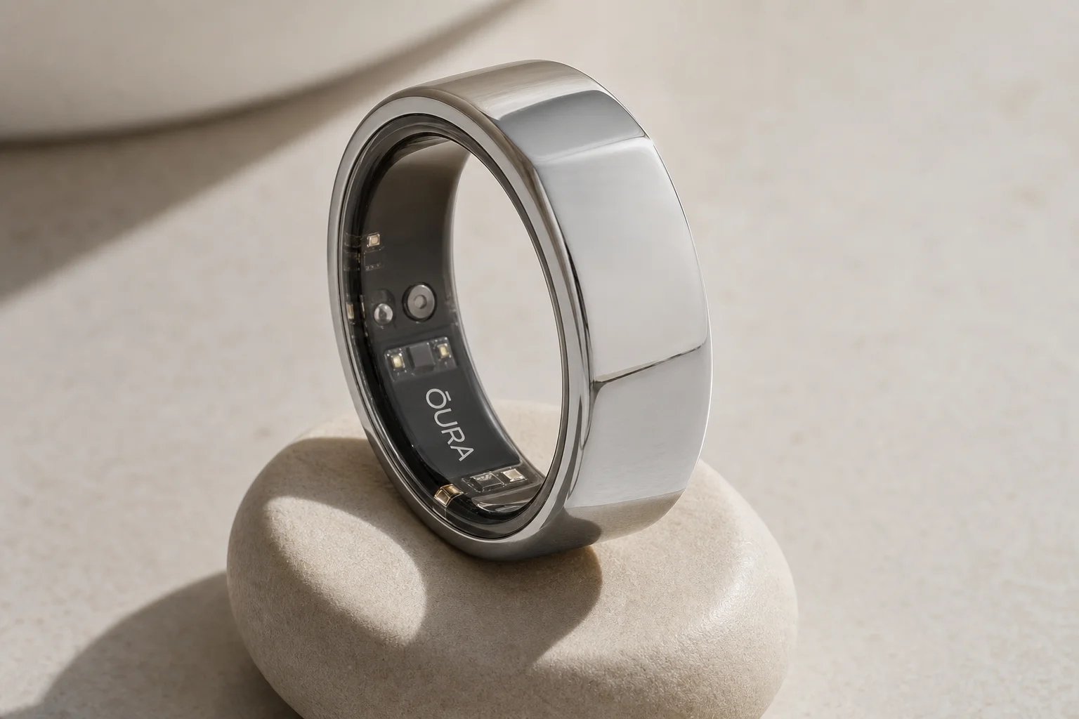 Collection of health monitoring devices including air quality monitor, smartwatch, scale, and sleep technology on wooden surface