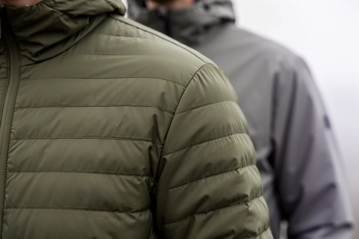 Close-up of fine quilted baffle stitching across an insulated jacket chest panel