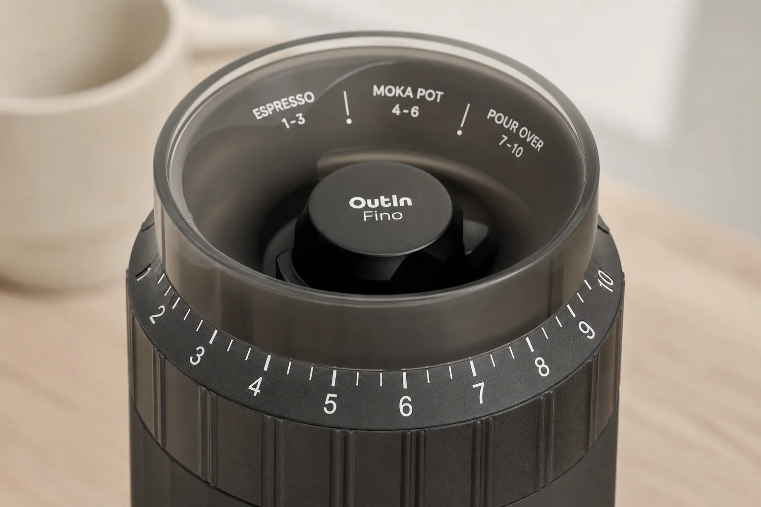 Close-up of the external grind adjustment dial with numbered settings and brewing method markings