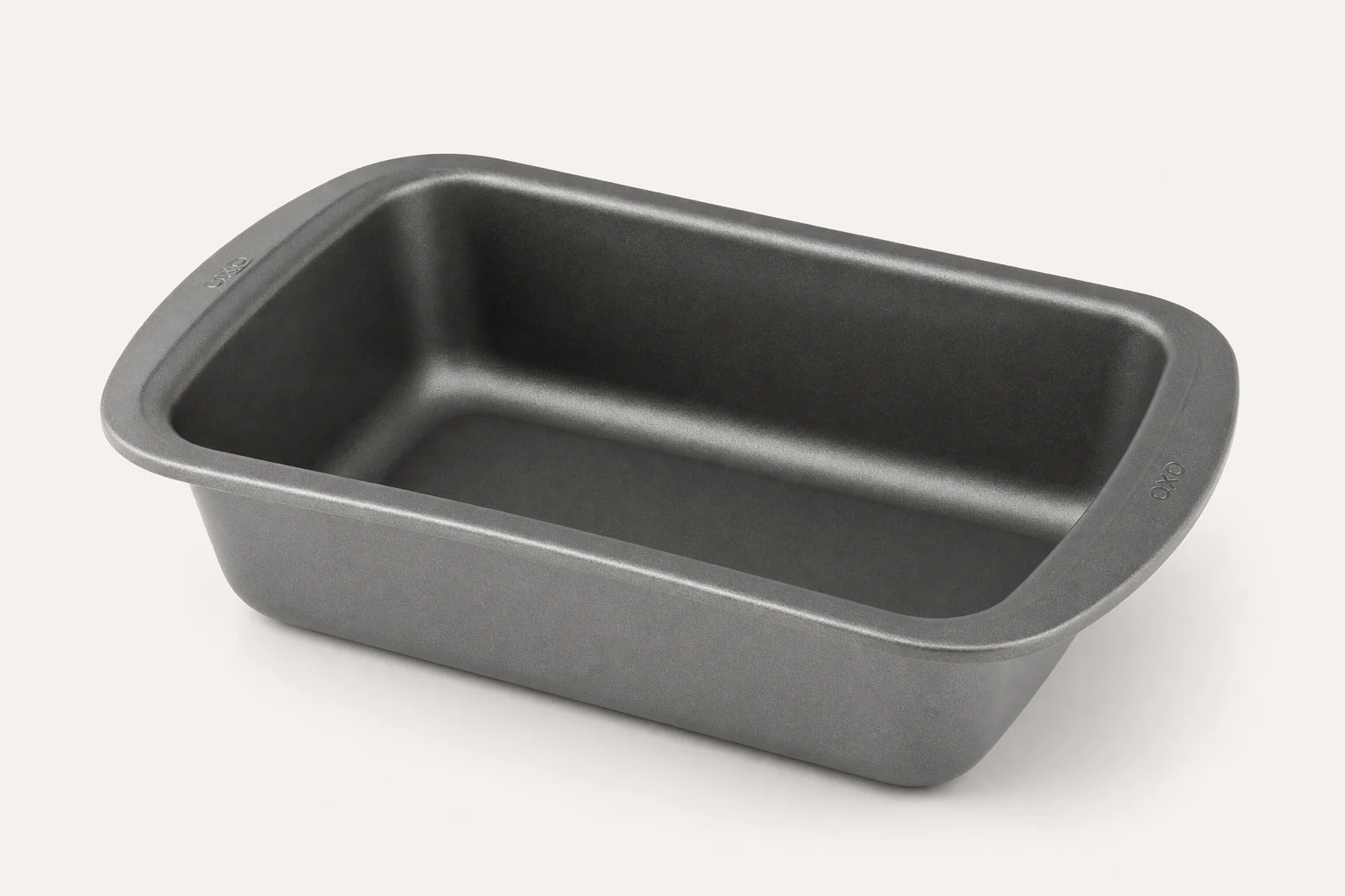 KitchenAid Classic Plus stand mixer and Zojirushi Supreme bread machine on concrete surface