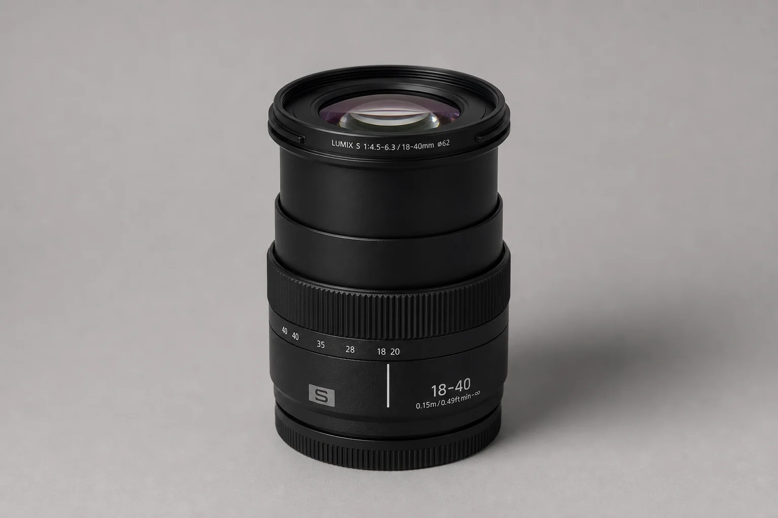 Panasonic S9 compact full-frame camera with 18-40mm lens on grey backdrop
