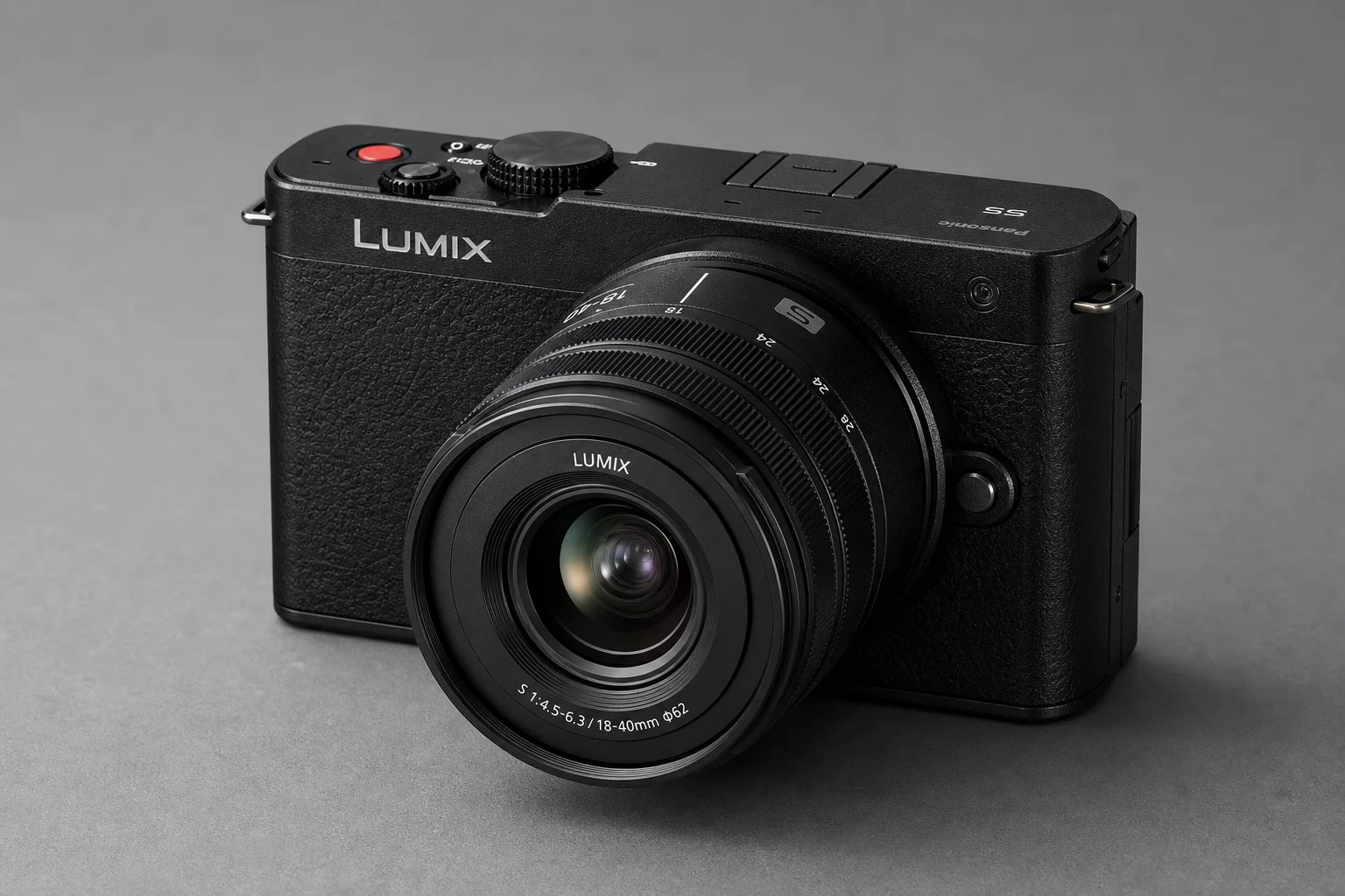 Panasonic S9 compact full-frame camera with 18-40mm lens on grey backdrop