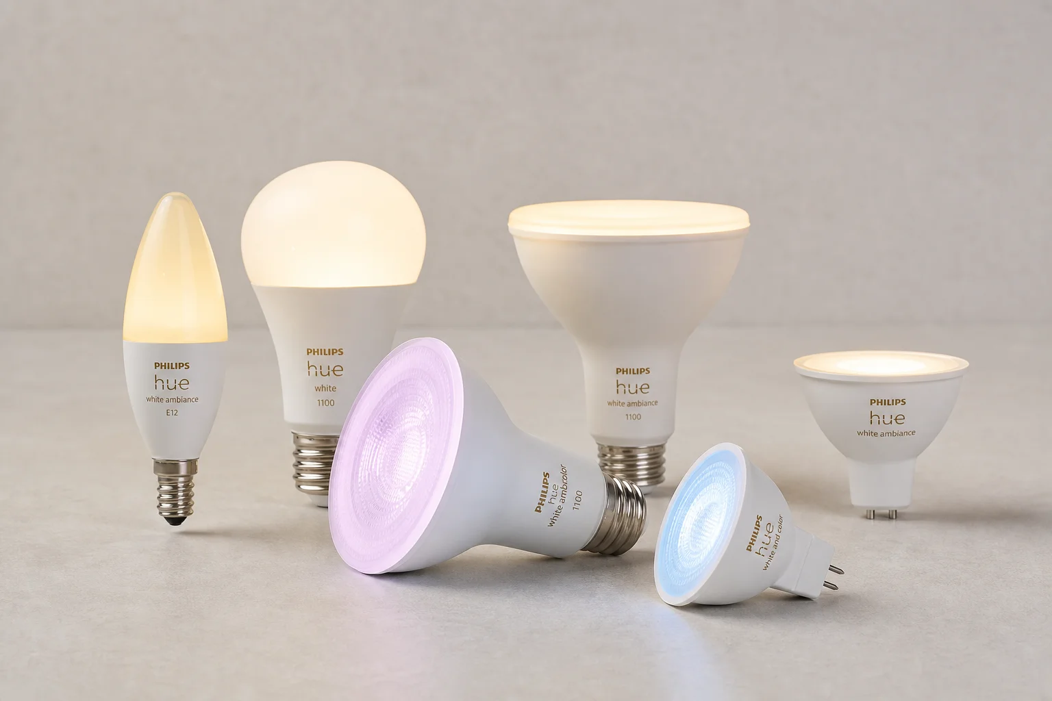 Smart home devices including hub, streaming device, thermostat, lock, and lights on a desk