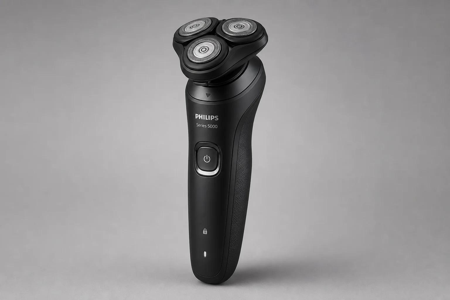 Four Philips shavers from Series 3000 to 9000 Prestige arranged in ascending order on concrete