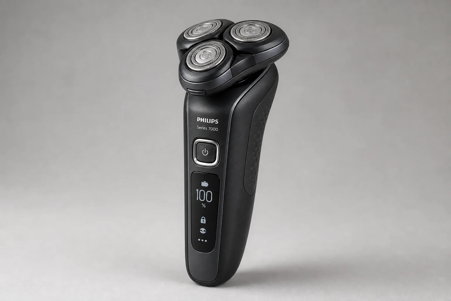 Four Philips shavers from Series 3000 to 9000 Prestige arranged in ascending order on concrete