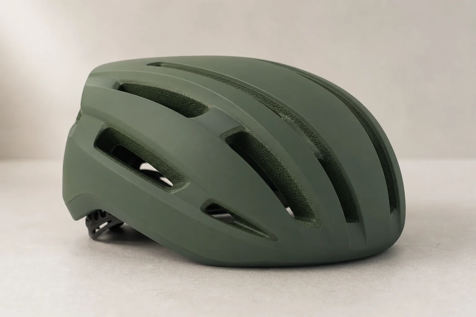 Four premium road cycling helmets displayed in a row on neutral backdrop