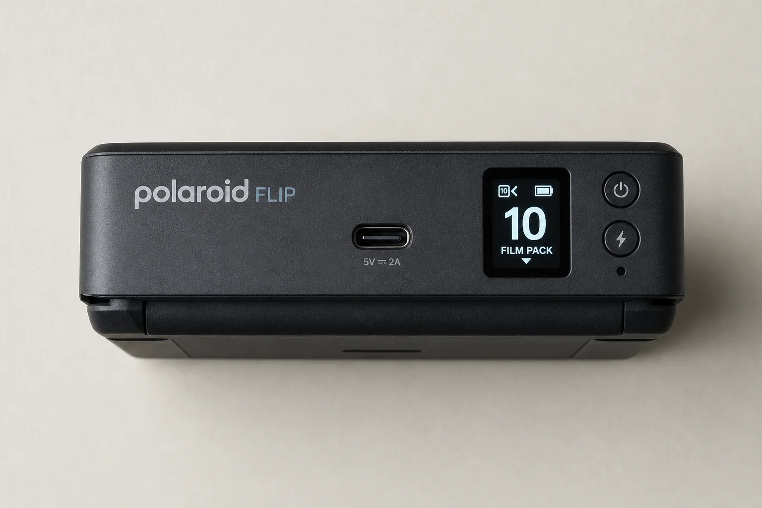 Polaroid Flip camera top surface showing USB-C port and LCD screen