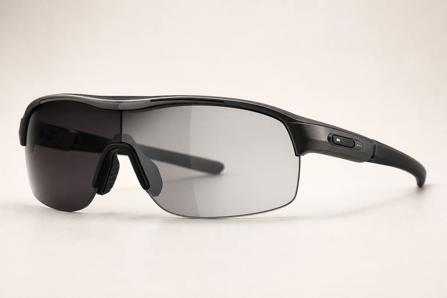 Poptic C1 electrochromic sport sunglasses showing dual lens tints on neutral grey background
