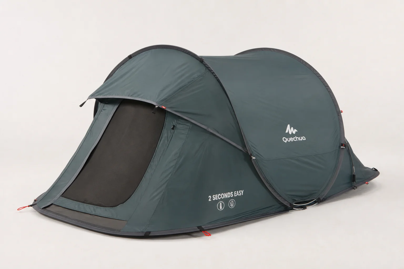 Six camping tents of varying sizes and styles arranged on a grey surface