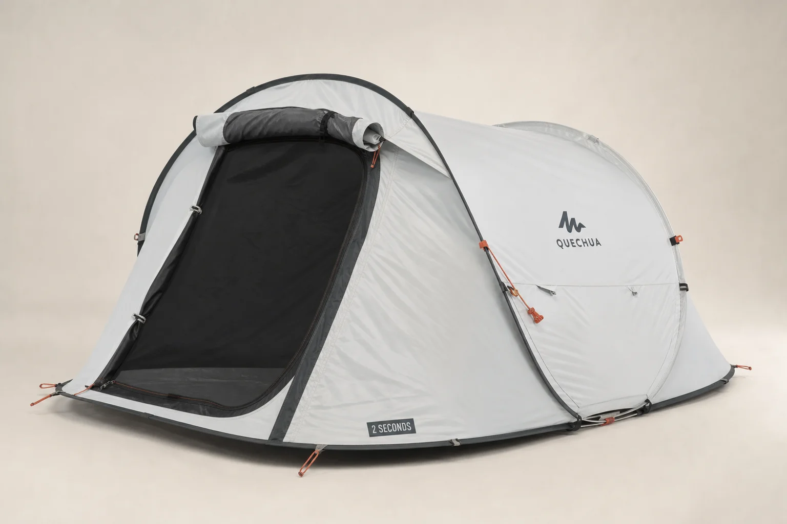 Six camping tents of varying sizes and styles arranged on a grey surface