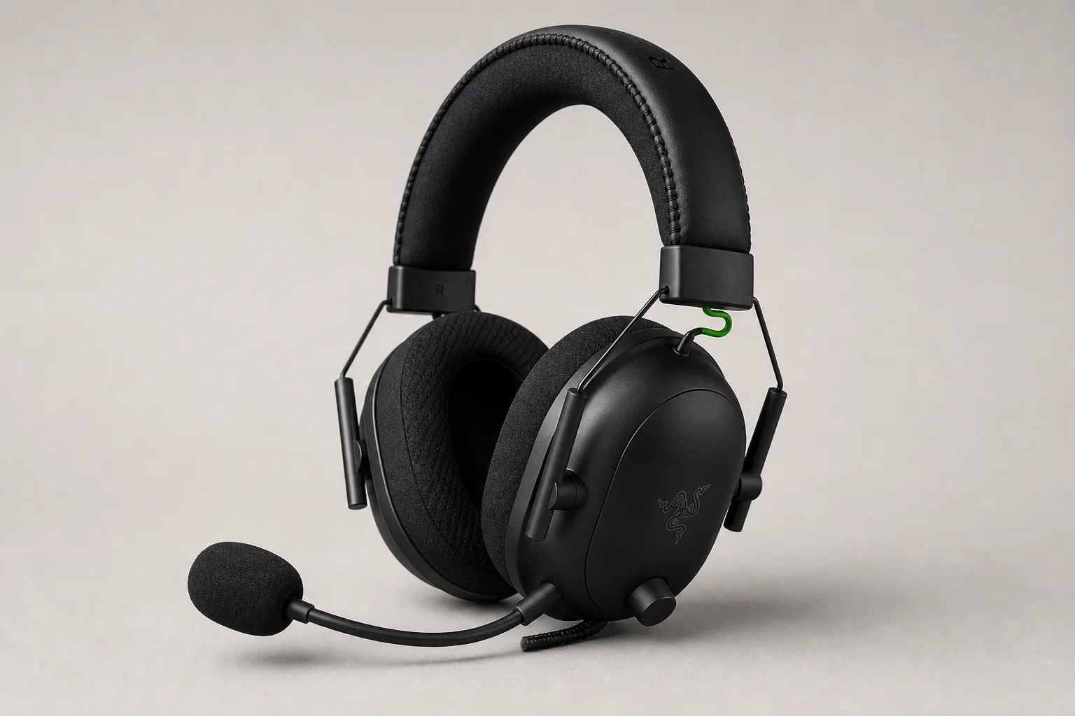 Six budget gaming headsets arranged on concrete surface