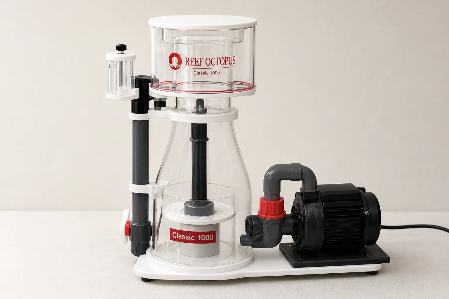 Three protein skimmers: Reef Octopus Classic 100, Classic 1000, and Tunze 9004 DC on neutral surface