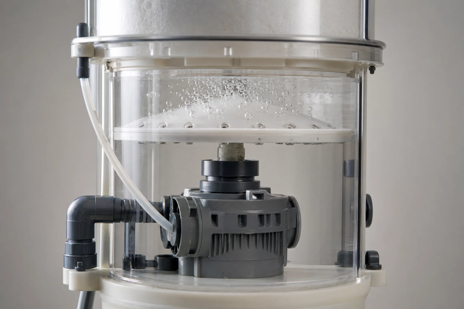 Close-up of protein skimmer pump mechanism showing air and water mixing