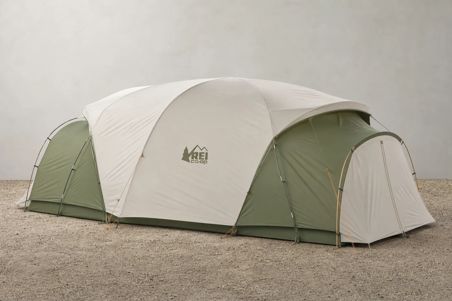 Six camping tents of varying sizes and styles arranged on a grey surface