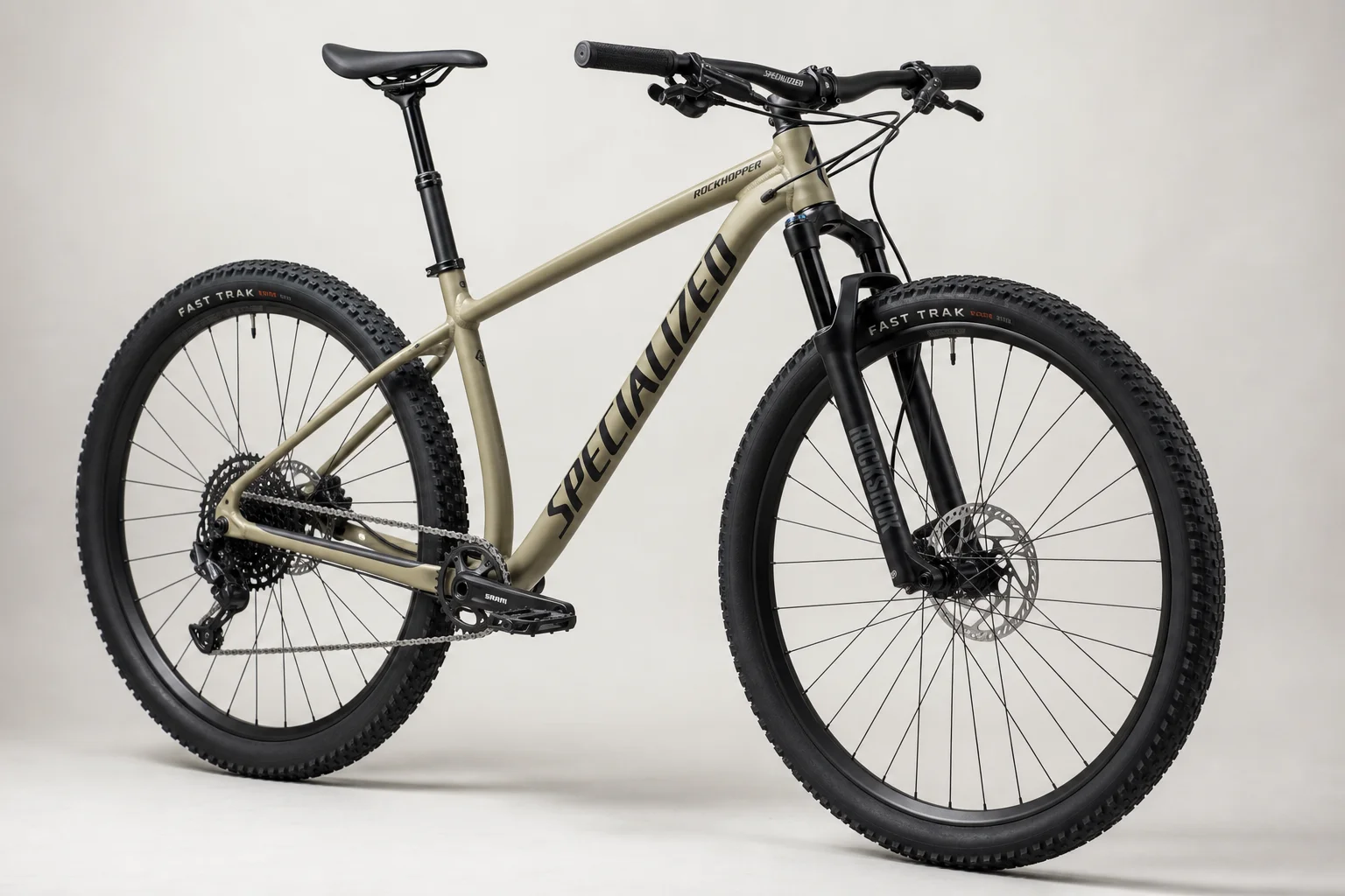 Specialized Rockhopper hardtail mountain bike with upgraded components on neutral backdrop