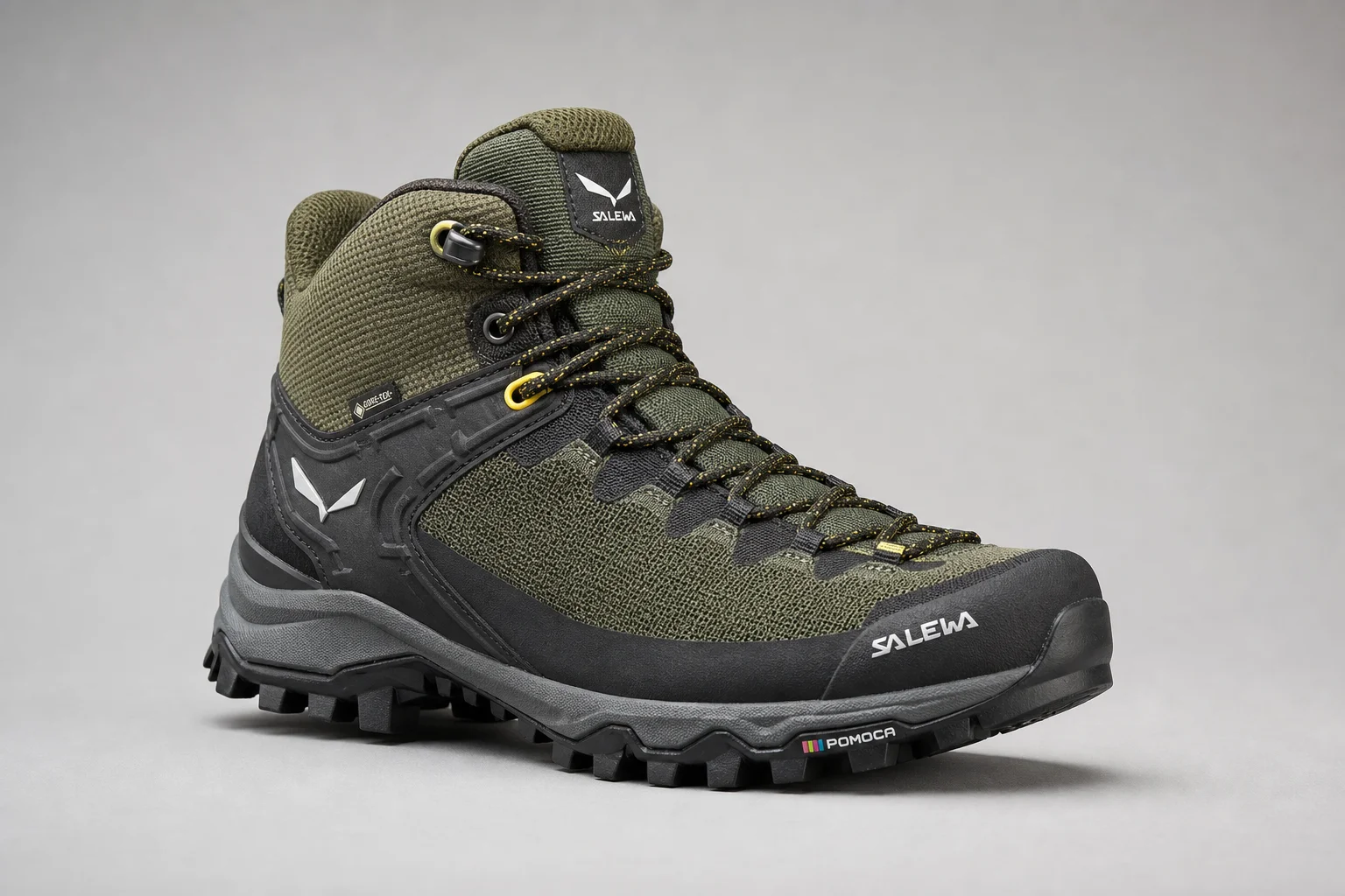 Five hiking shoes ranked and arranged on concrete surface