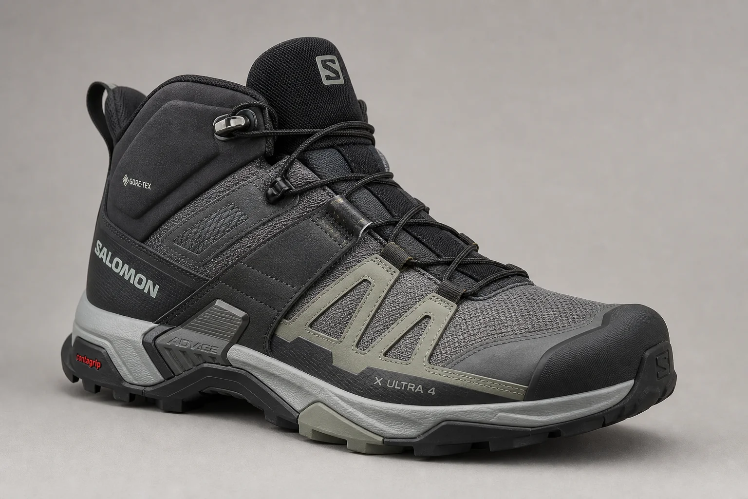 Seven hiking boots arranged on concrete surface representing different styles and purposes