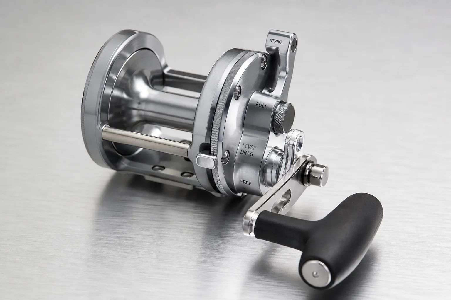 Three conventional fishing reels displayed side by side on neutral backdrop