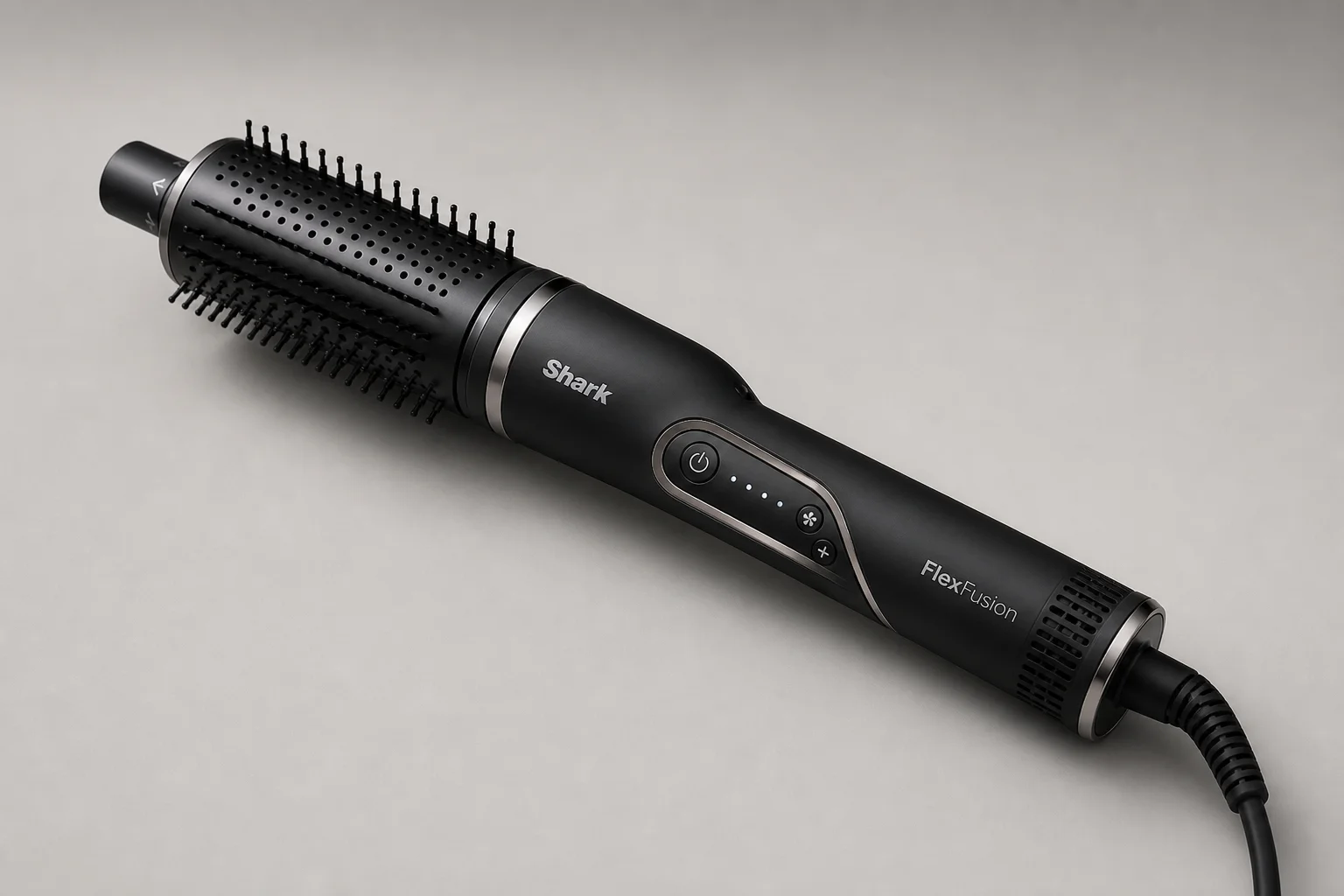 Shark FlexFusion Haar-Tool mit verschiedenen Styling-Aufsätzen auf einer Betonoberfläche