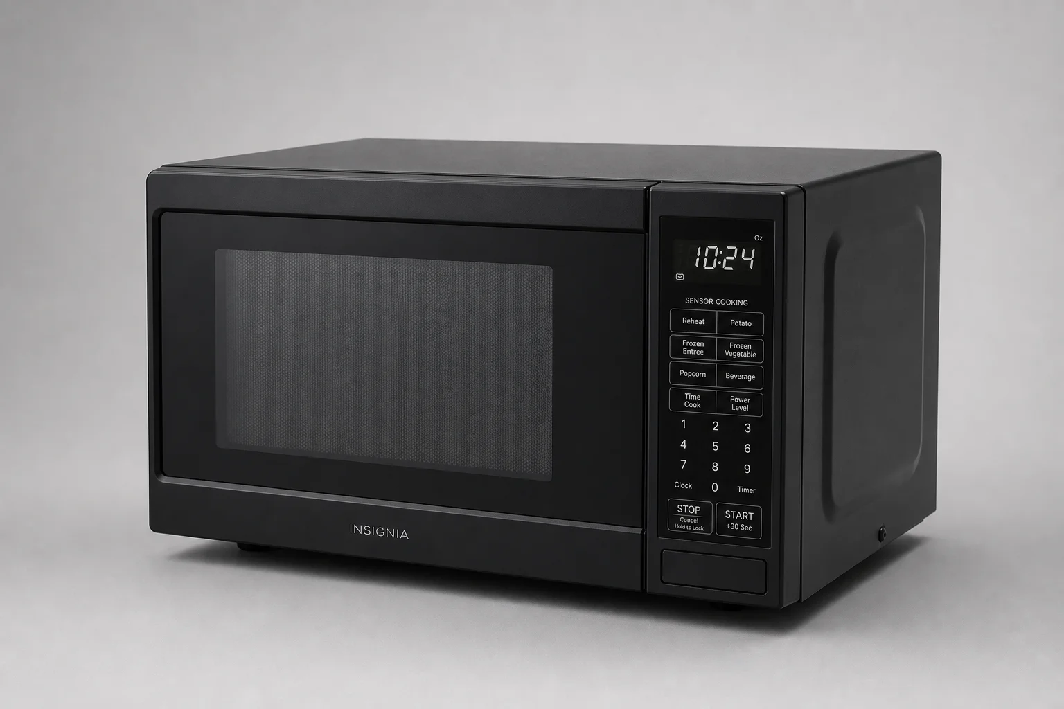 Microonde da appoggio Breville e Sharp affiancati su un piano cucina