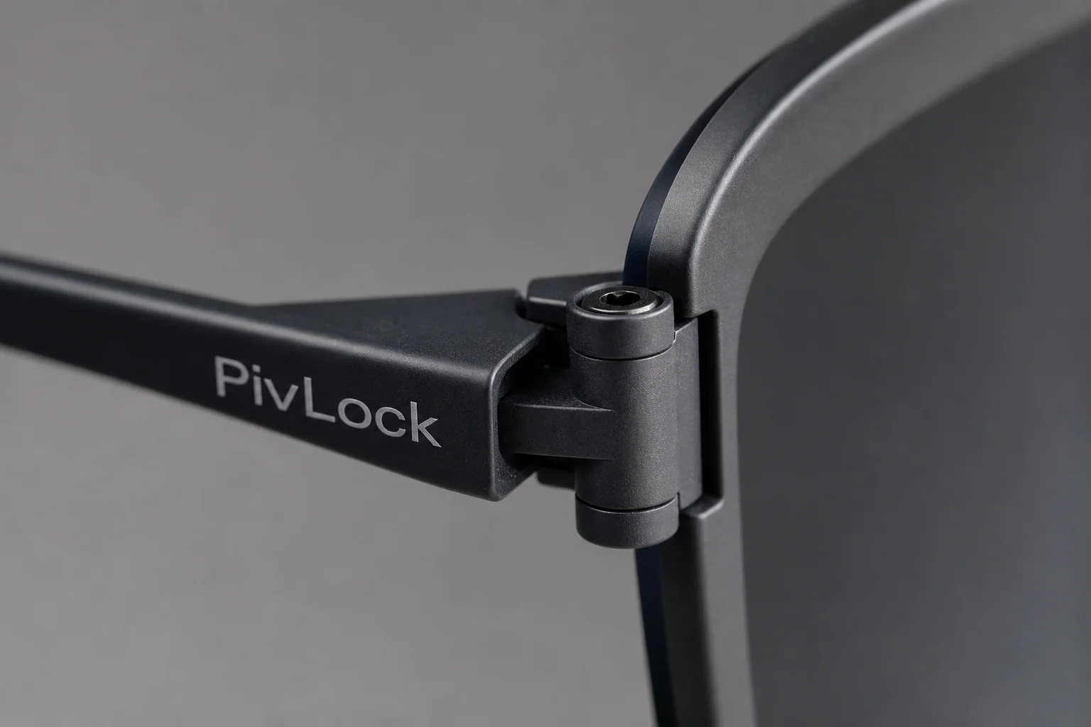 Close-up detail of the PivLock lens attachment mechanism