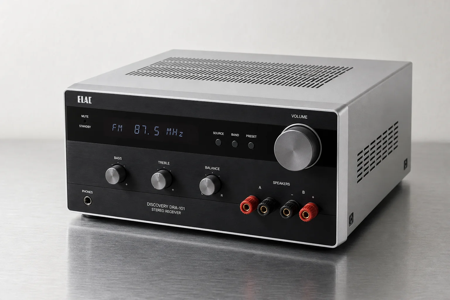 Six stereo receivers arranged on concrete surface showing various sizes and designs