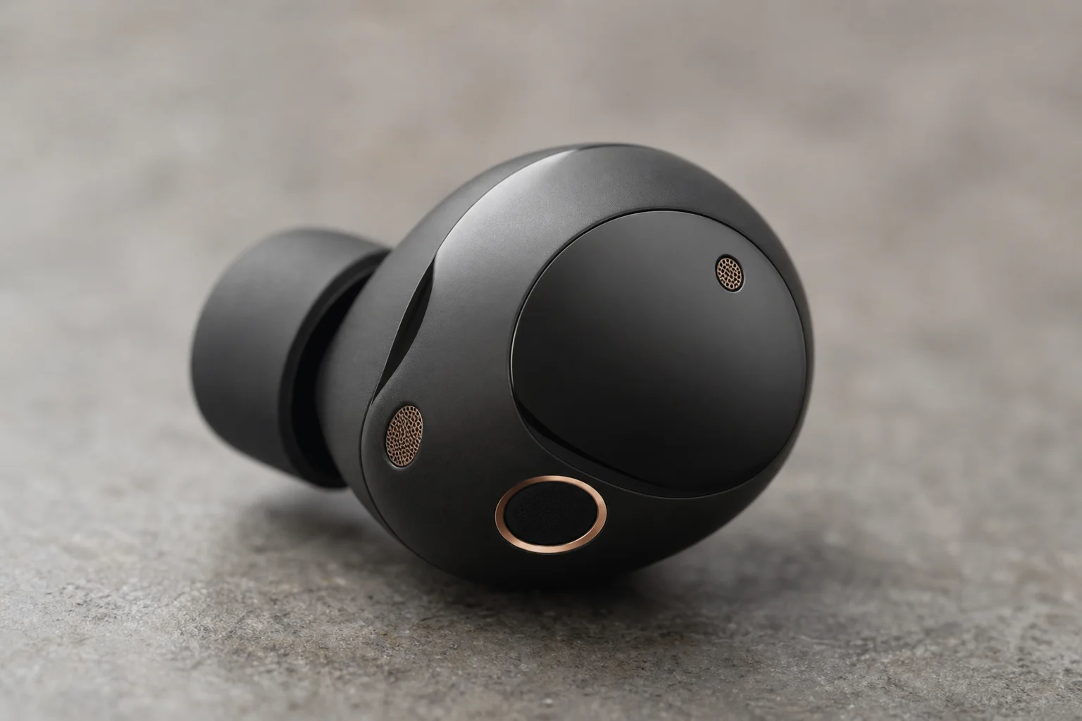 Close-up of earbud microphone array and acoustic design details